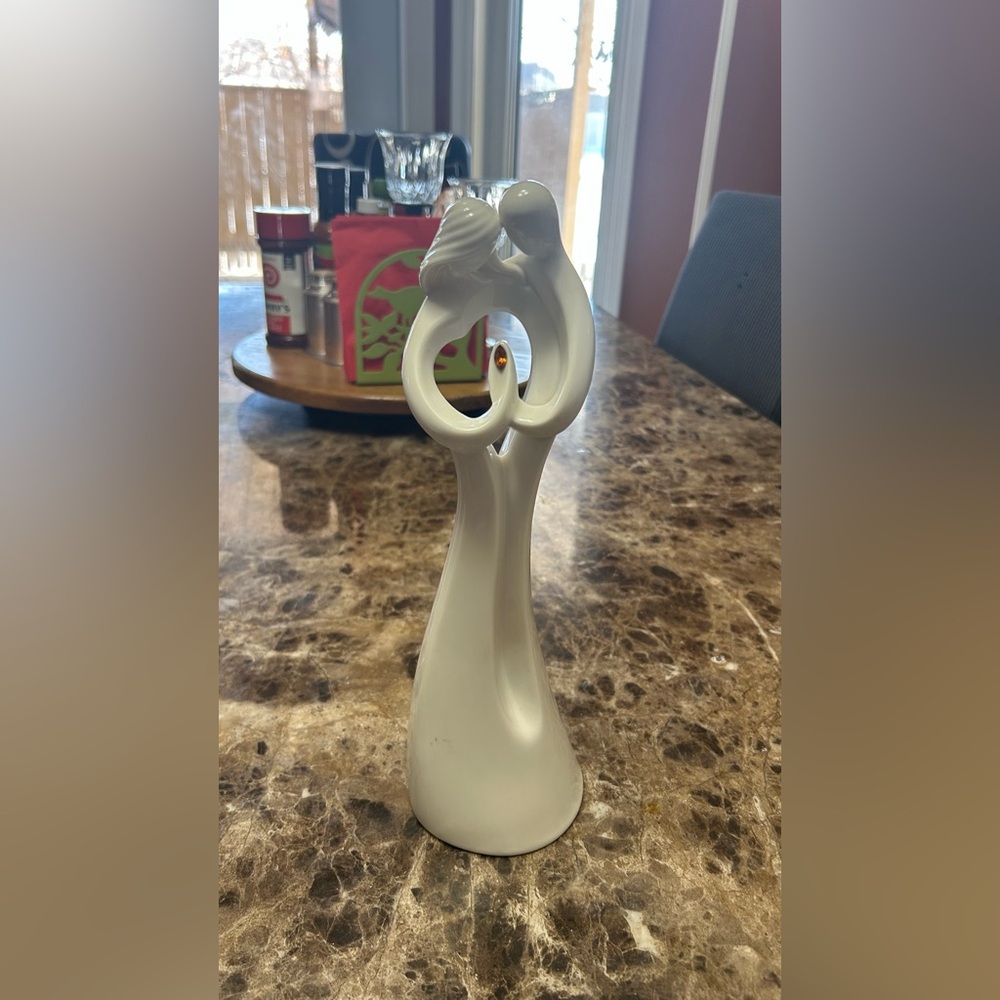 Circle of Love statue for a 50-year anniversary made by Kim Lawrence 11.5” tall